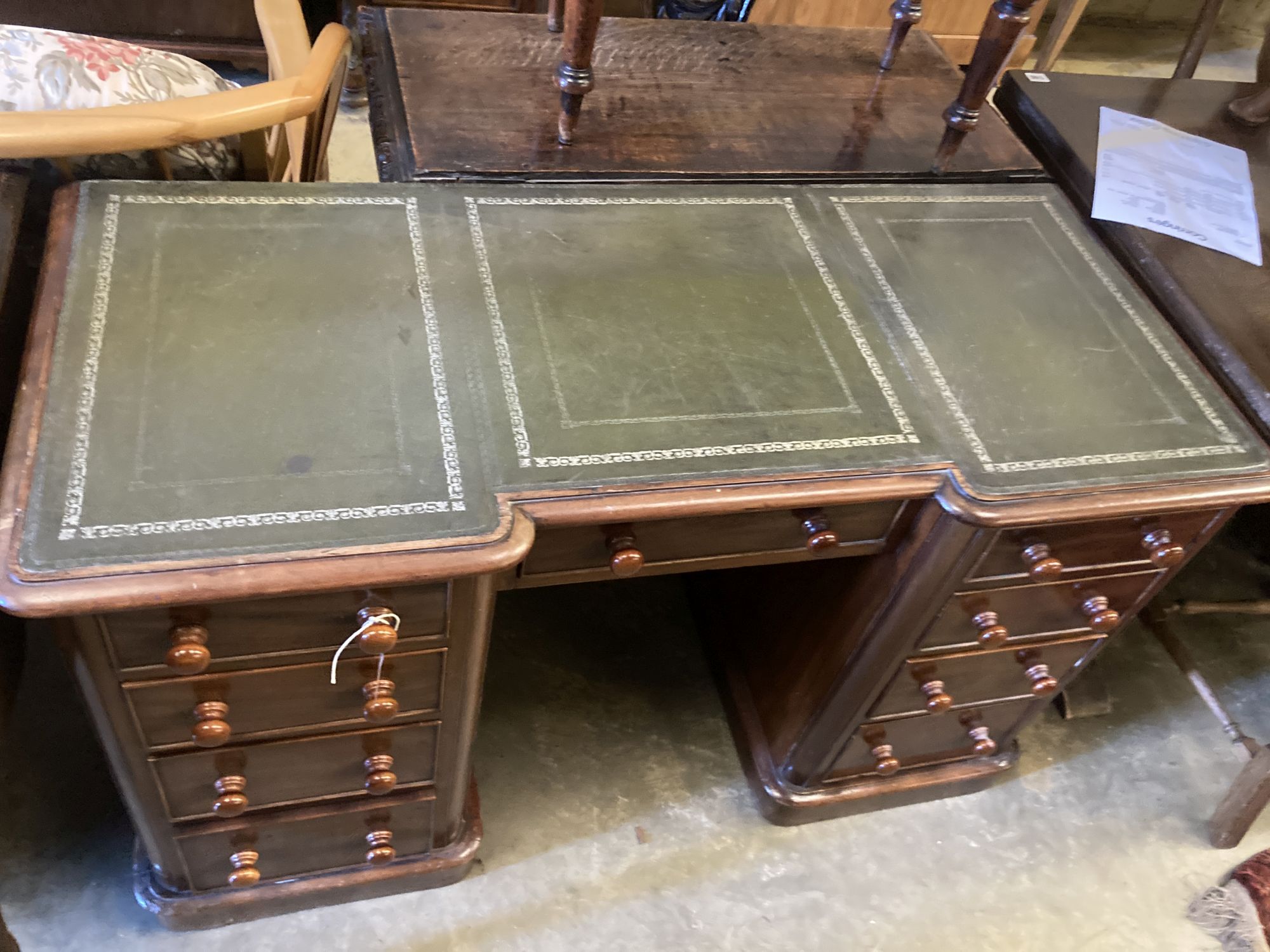 A Victorian mahogany kneehole desk, width 122cm, depth 54cm, height 74cm